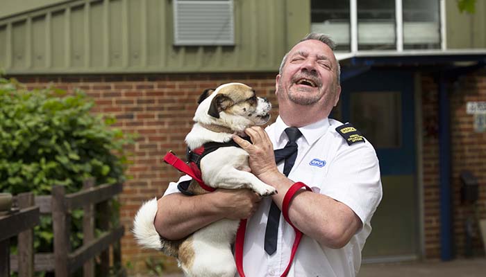 Animal rescue officer with rescue dog © RSPCA