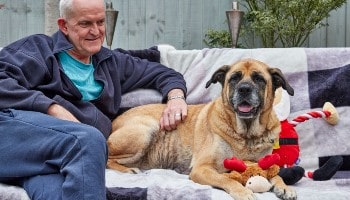 Molly Moo with her adopter, John © RSPCA
