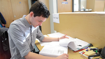 Volunteer Richard Burn doing paperwork in head office © Philip ToscanoRSPCA photolibrary