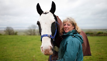 Horse fosterer Liz Handford with her rescue horse Horlicks © RSPCA