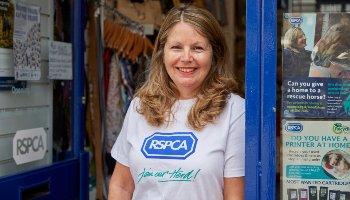 Volunteer Joanna Mills portrait in RSPCA shop in Richmond, Surrey