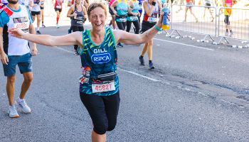 RSPCA runner at the cheer station during half marathon