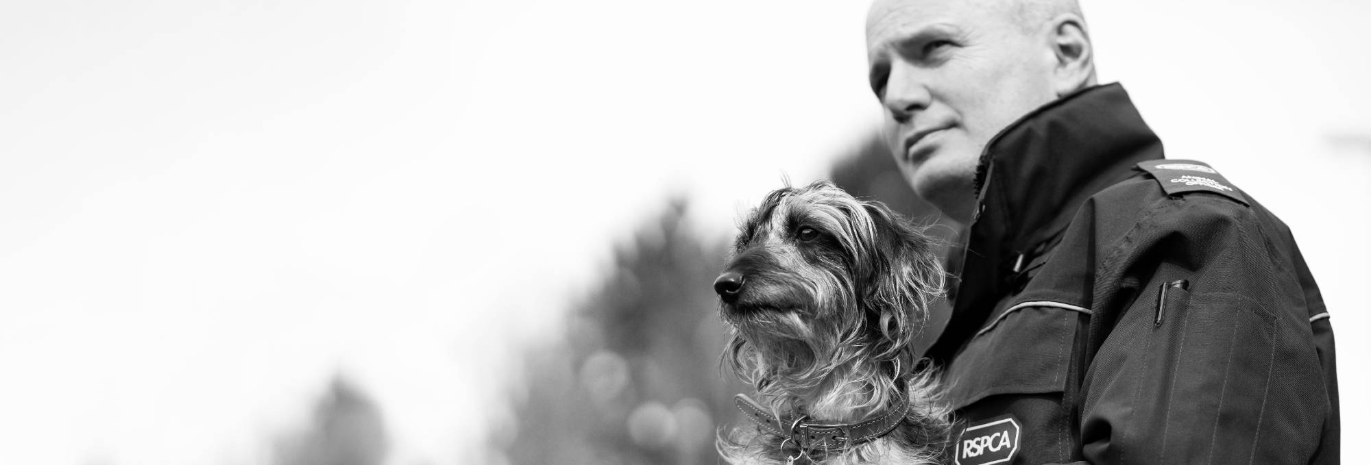 RSPCA Animal Rescuer holding a dog