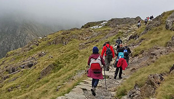 People walking on a mountain side