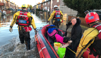 RSPCA Animal Rescuers helping woman and her pets through flood