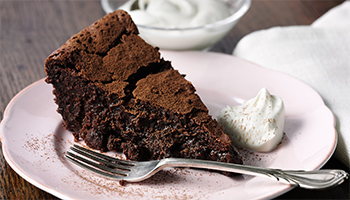 Raisin and bitter chocolate mud cake