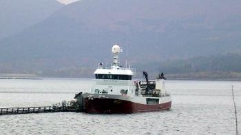 boat transporting farmed salmon