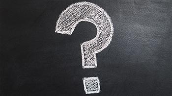 Chalk question mark on chalk board
