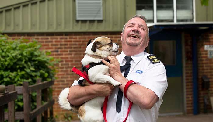 Animal rescue officer with rescue dog