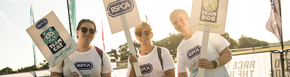 RSPCA supporters holding signs