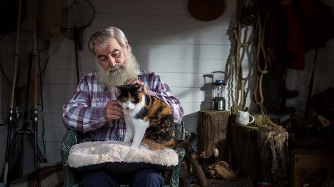 Legacy giver Geoff holding cat